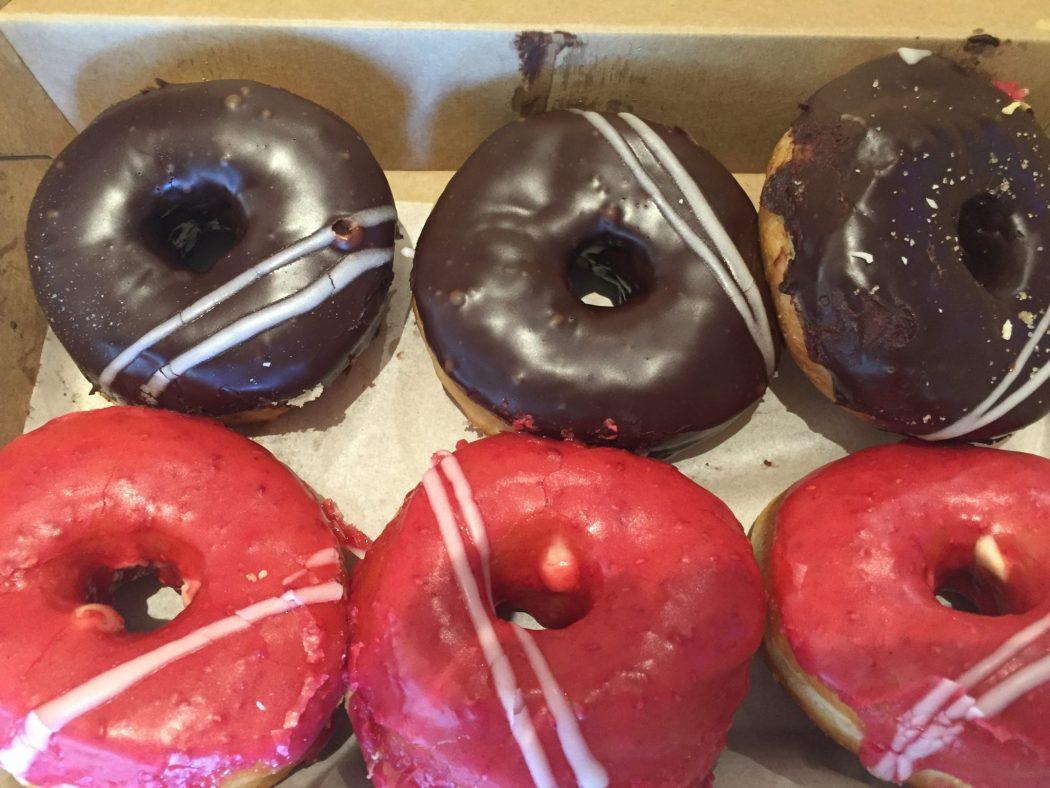 5 Best Places to Stay in Melbourne for Boutique Hotel Lovers 26 donuts with pink and chocolate icing