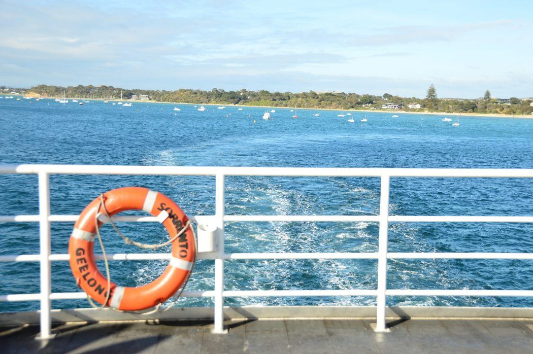 8 Great Things to do Mornington Peninsula 2 side of the queenscliff ferry with orange life saving tube and water behind