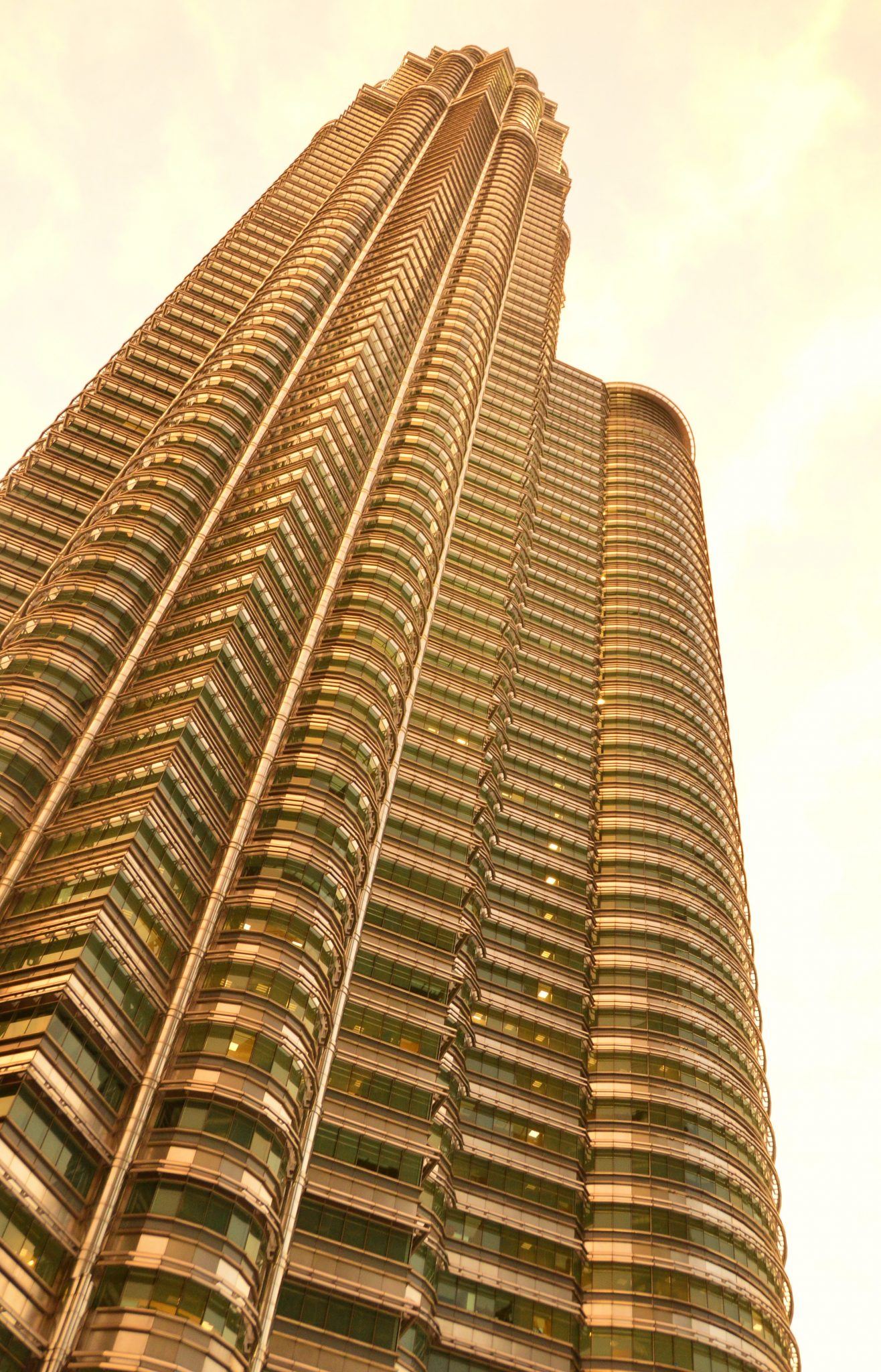 Kuala Lumpur in One Day: Hidden Gems & Classics 6 a petronas tower from the ground looking up