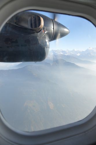 propellor outside plane window over the himalayas propellor outside plane window over the himalayas