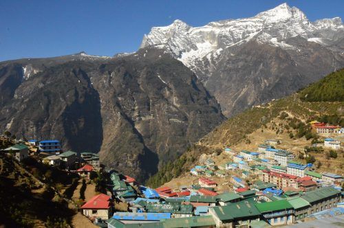 the town of namche bazaar with mountains in the background the town of namche bazaar with mountains in the background
