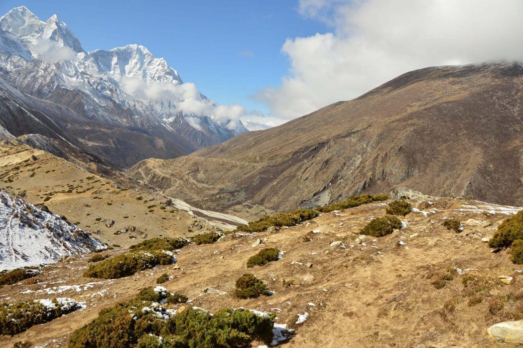 view along the everest base camp trek on the seventh day leaving Dingboche