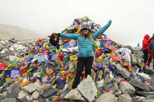 female trekker at the prayer flags everest base camp female trekker at the prayer flags everest base camp