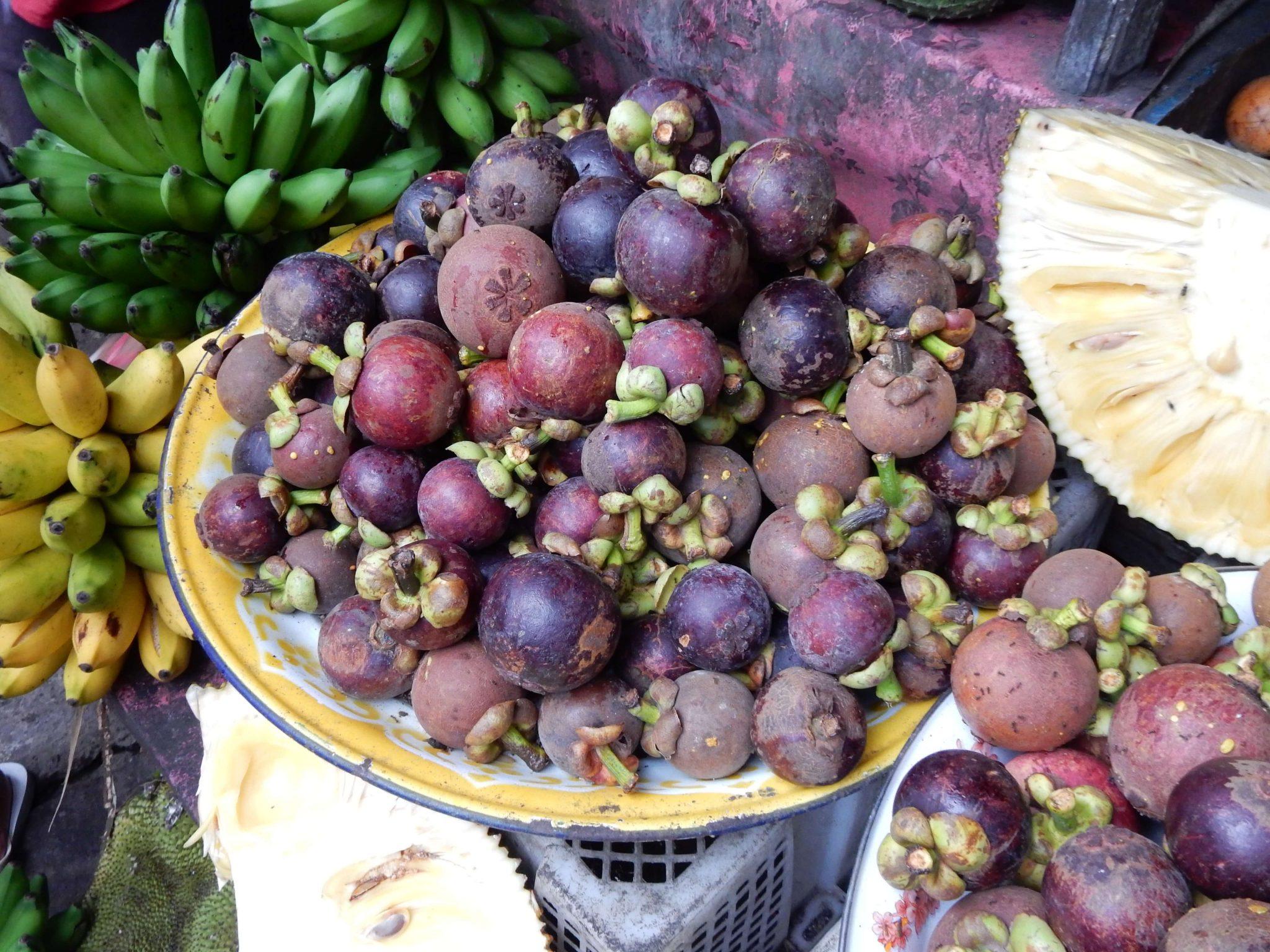 mix of grapes and other fruits in bowls in bali