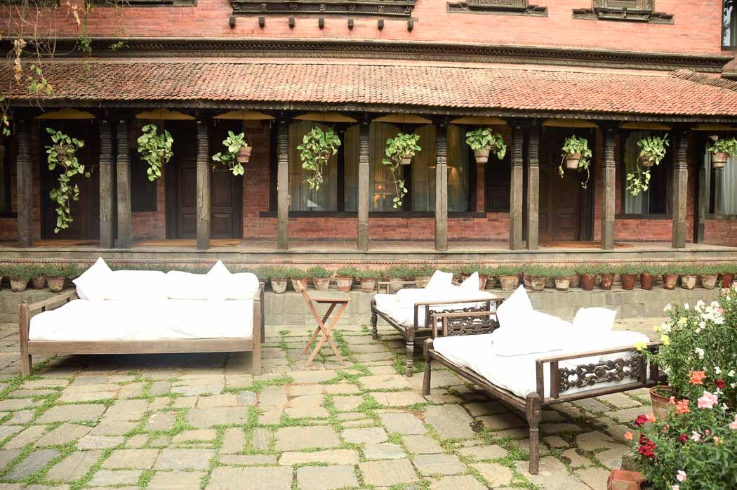 9 Best Places to Visit in Kathmandu & Nearby 1 outdoor couches in the courtyard at dwarika's kathmandu
