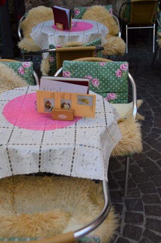 chairs and tables with wooly and colourful rugs and cusshions innsbruck chairs and tables with wooly and colourful rugs and cusshions innsbruck