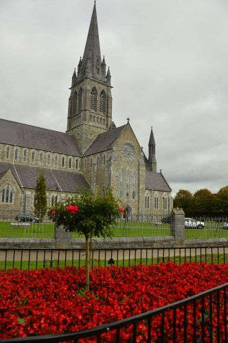 killarney church with red flowers in killarney ireland killarney church with red flowers in killarney ireland