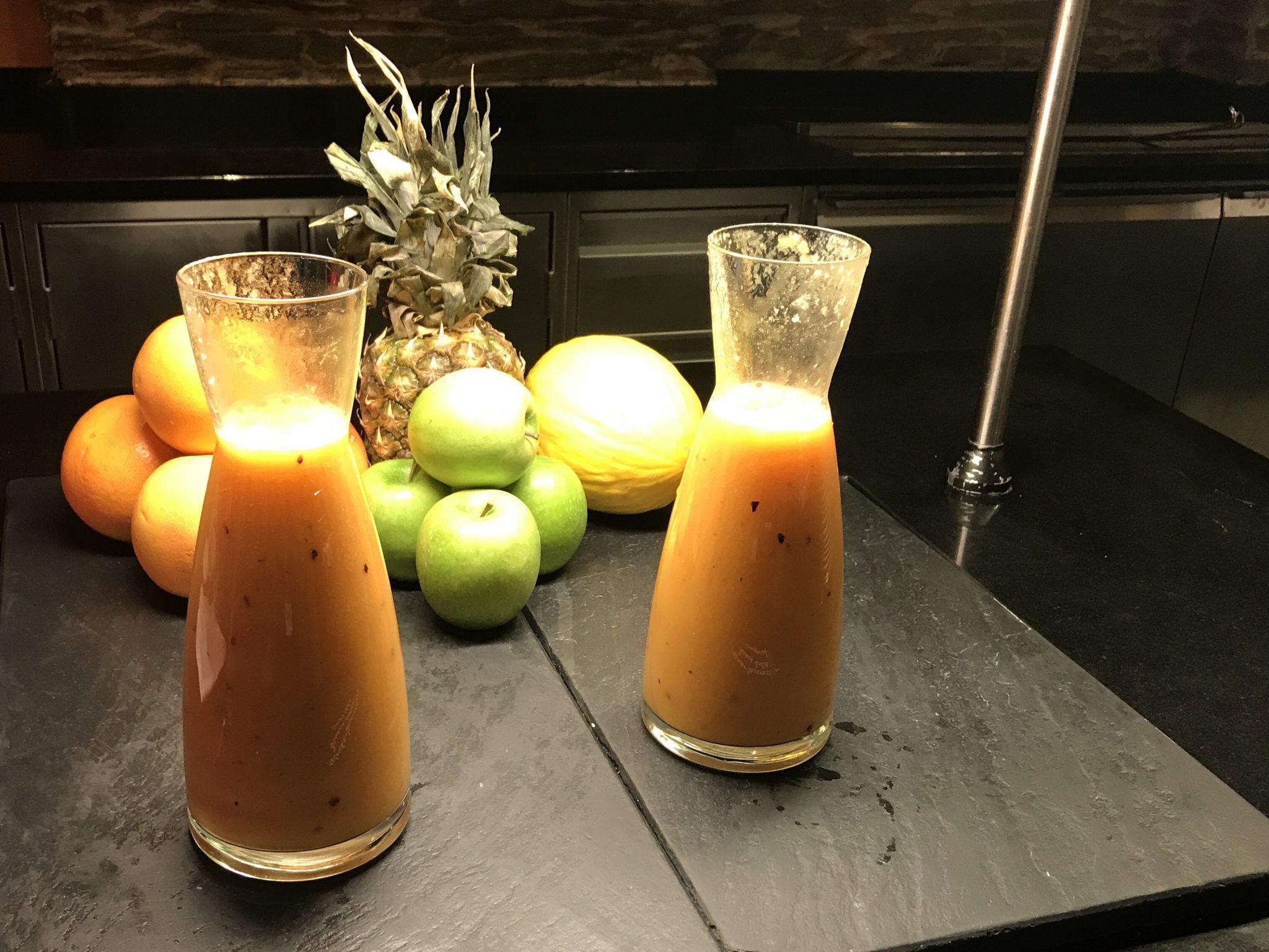 Hotel Arosa Kitzbühel Austria Boutique Hotel Review 6 2 carafes of juice and pineapple and fruit on breakfast buffet at Arosa Kitzbühel