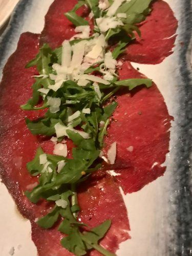 reindeer carpaccio with rocket and parmesan starter item on menu at hotel ranga iceland