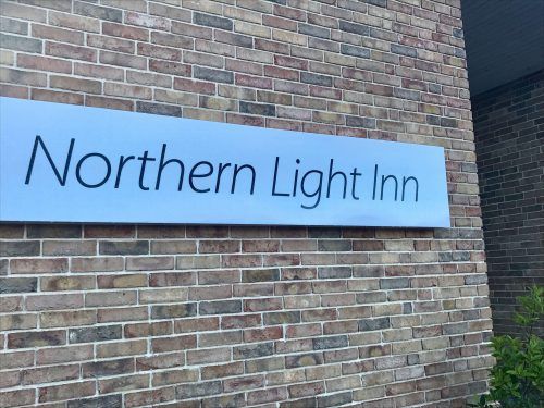 northern light inn sign iceland