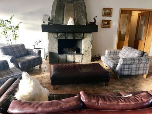lounge area at northern lights inn iceland