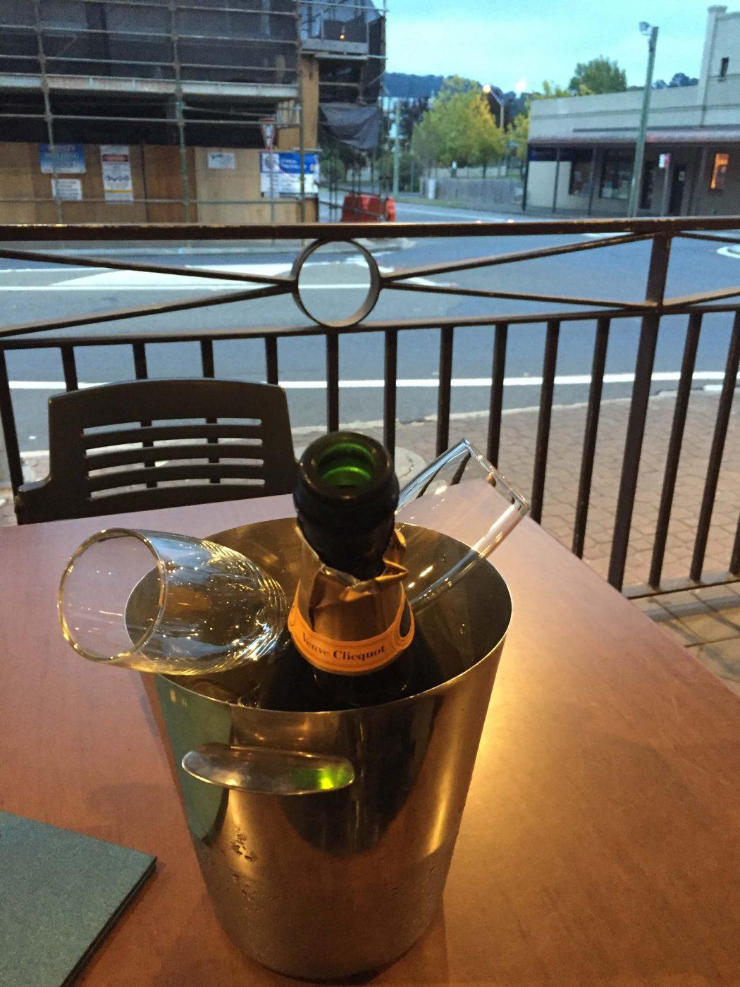10 Best Weekend Getaways From Sydney for Boutique Hotel Lovers 14 bottle of veuve clicquot in an ice bucket on an outside table at the bowral hotel