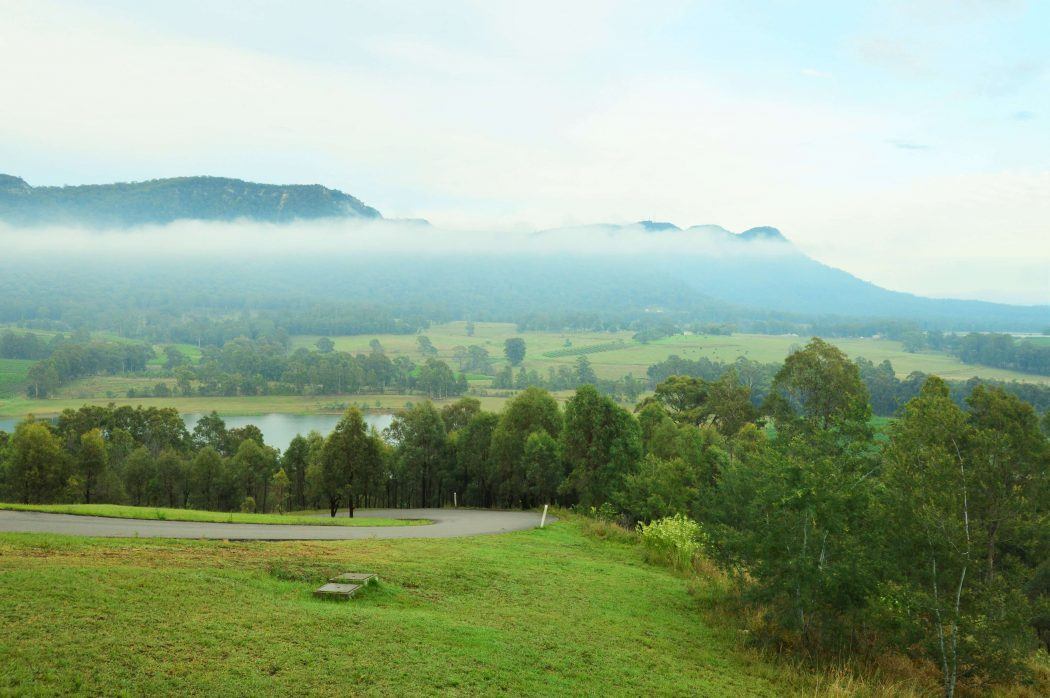 10 Best Weekend Getaways From Sydney for Boutique Hotel Lovers 30 overview of trees and parkland with mist in the hunter valley new south wales australia