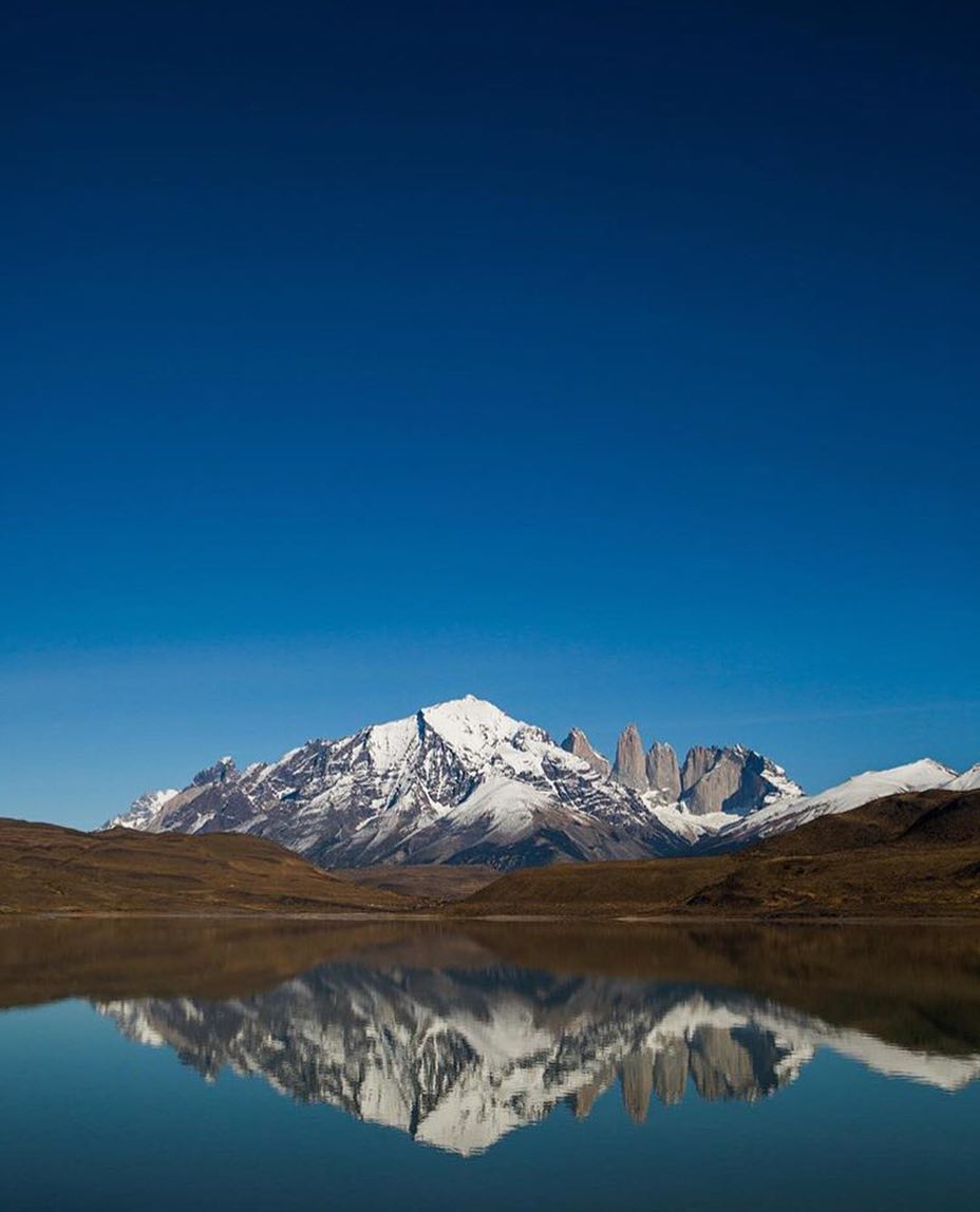 Chile Itinerary 2 Weeks in Boutique Hotels 13 Mountain against lake in Torres Del Paine patagonia