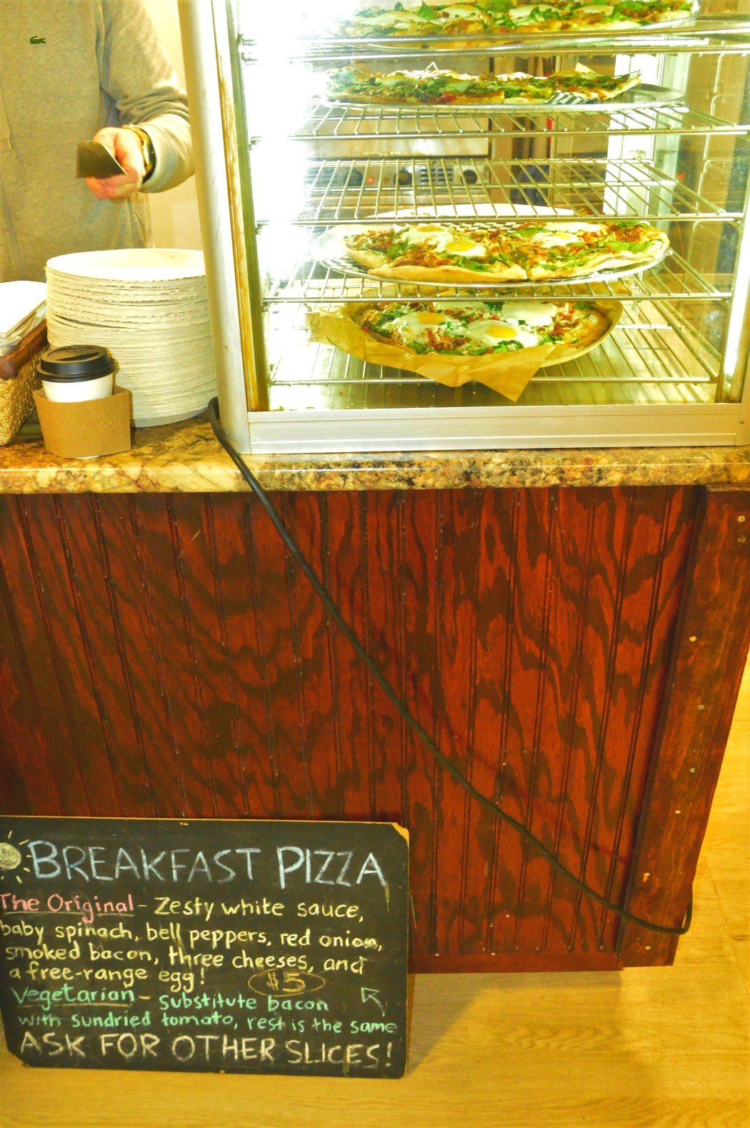 Halifax Farmers Market: Everything You Need to Know 8 breakfast pizza sign and on display