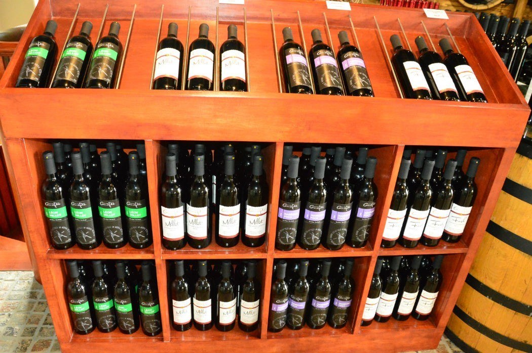 9 Best Wolfville Wineries (2022) You Won't Want to Miss 21 mutiple bottles of wine merchandised and on display