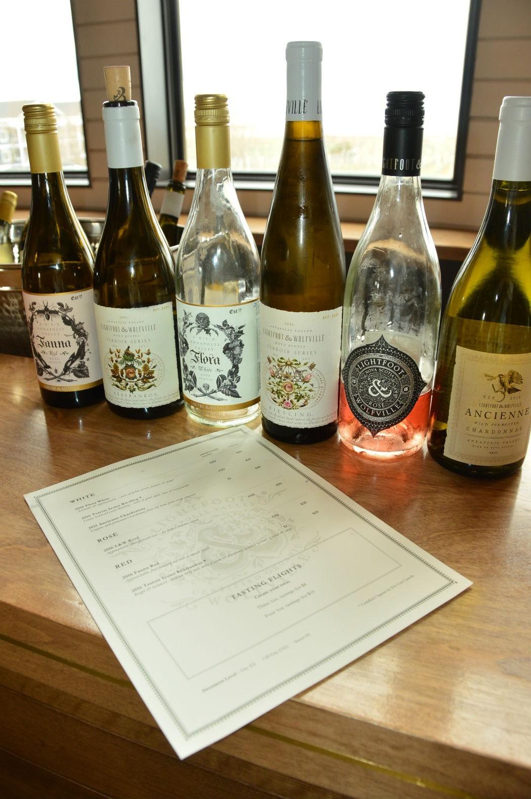 6 lightfoot and wolfville wine bottles and price list