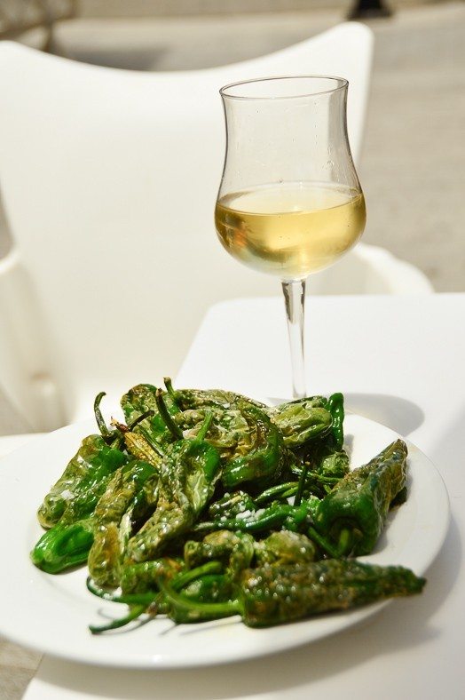 7 Best Gran Canaria Markets You Won't Want to Miss 7 plate of padron peppers and glass of white wine