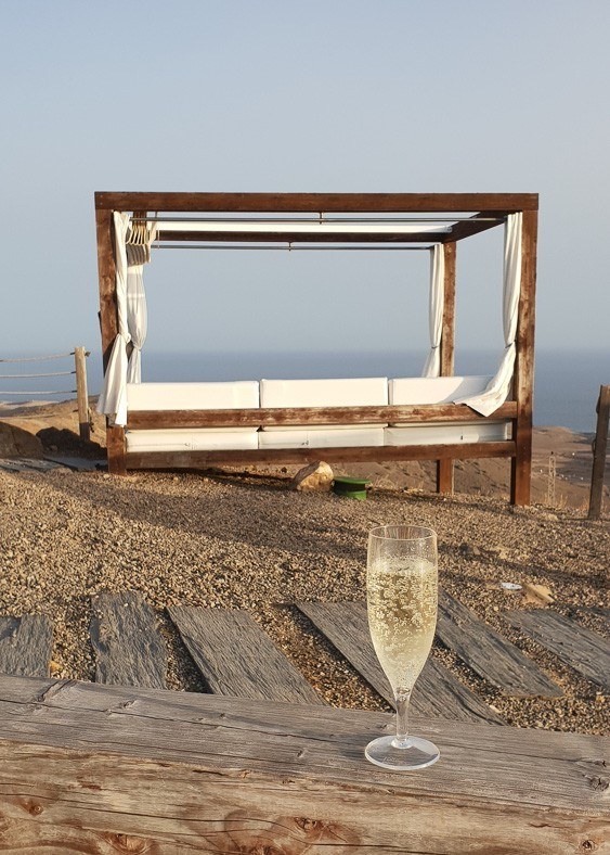 7 Best Gran Canaria Markets You Won't Want to Miss 22 Glass of Cava in front of sun bed Salobre Resort Gran Canaria