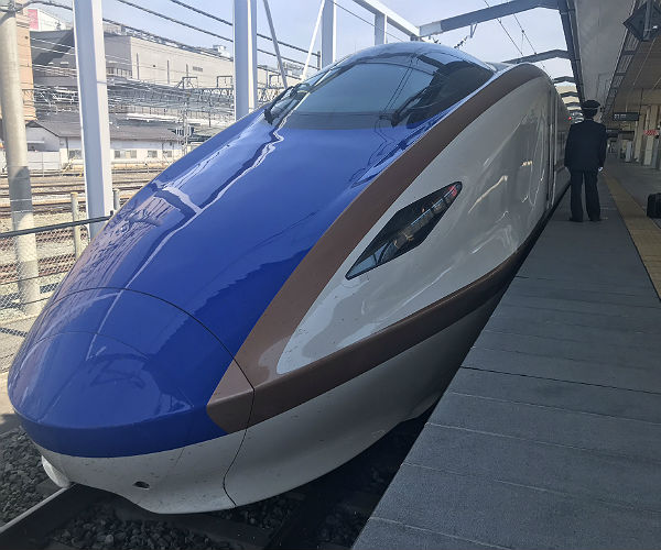 Nakasendo Trail and What to Expect at a Japanese Ryokan 9 the front of a japanese bullet train