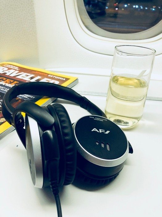 air france headphones and glass of champagne on the a380