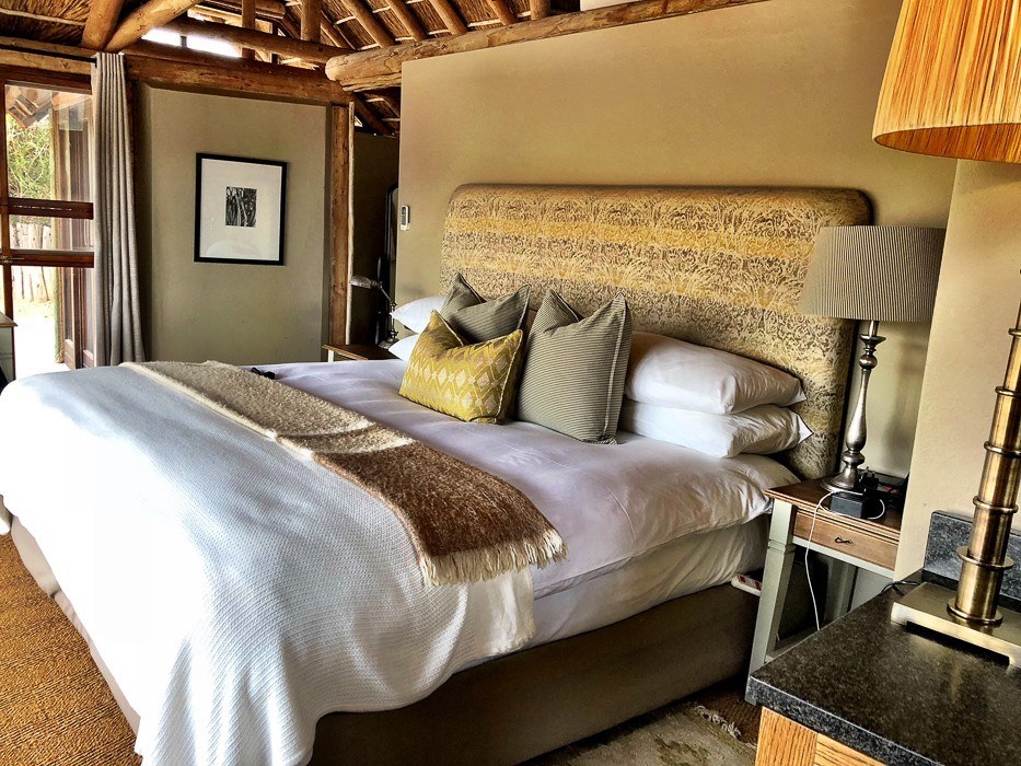 bedroom and bed at Kwandwe safari lodge south africa
