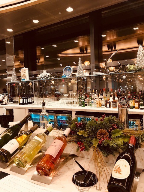 wines on display in United Airlines lounge Heathrow Terminal 2