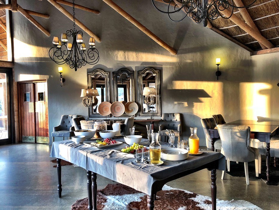Travel Expert Packing List for Safari 19 inside the kwandwe restaurant with a table set up for a breakfast buffet