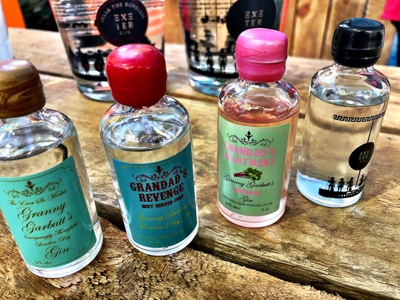 small bottles of gin with colourful packaging