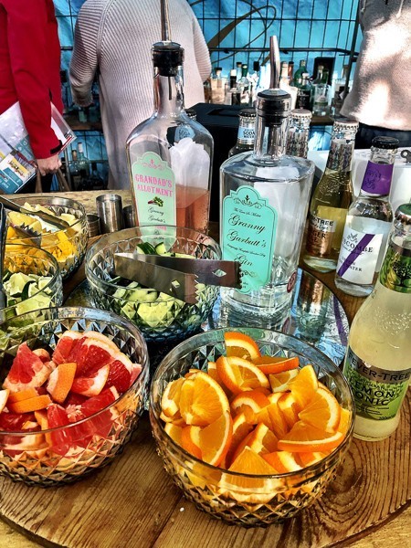 6 Cafes in Exeter Not to Miss 22 Gin Palace Exeter bottles of gin and fresh fruit
