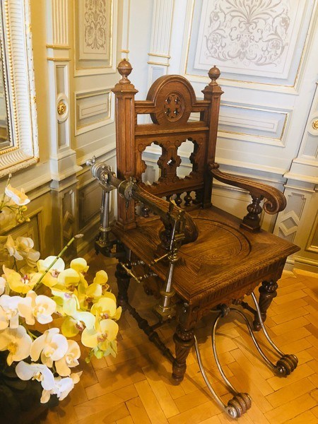 3 Best Czech Republic Spa Towns in Bohemia 23 Edward VII's wooden chair in an elaborate room at Nove Lazne hotel