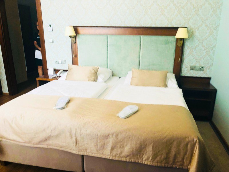 3 Best Czech Republic Spa Towns in Bohemia 26 imperial hotel room double bed with slippers