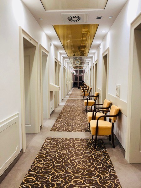 3 Best Czech Republic Spa Towns in Bohemia 39 corridor with chairs leading to the Radon baths Jachymov