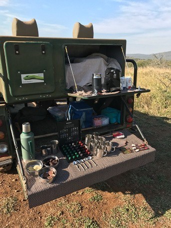 7 Best Camera for Safari Options (2022) & Safari Phone Photography Guide 22 safari vehicle with coffee bar in the back