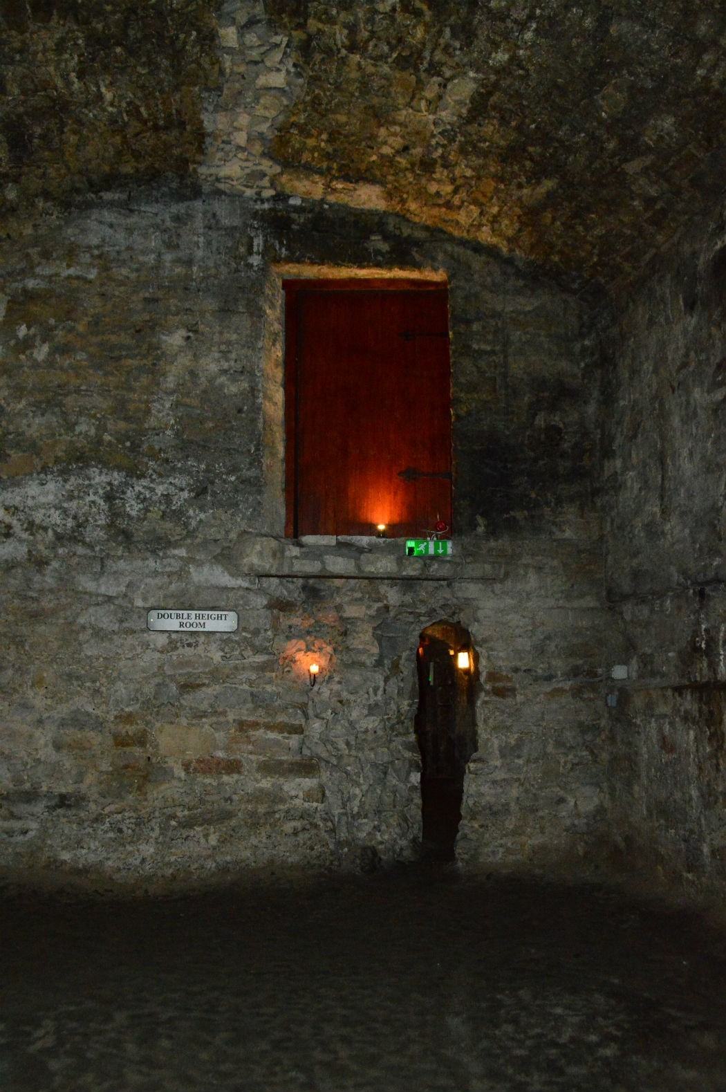 inside the edinburgh vaults with one candle light