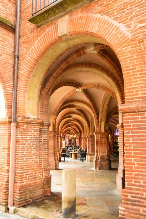 14 Best Things to Do in Tarn et Garonne 20 The archways of the main square in Montauban