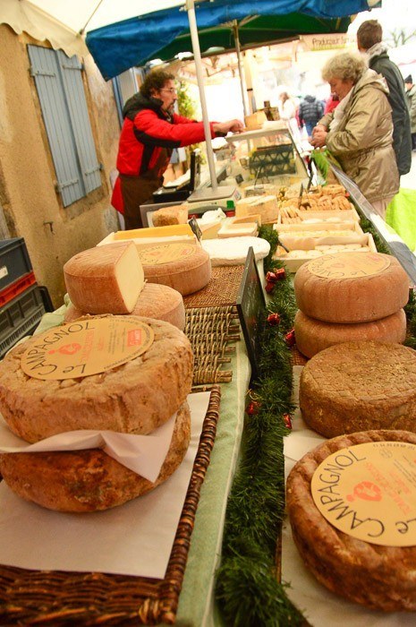 saint antonin market wheels of cheese