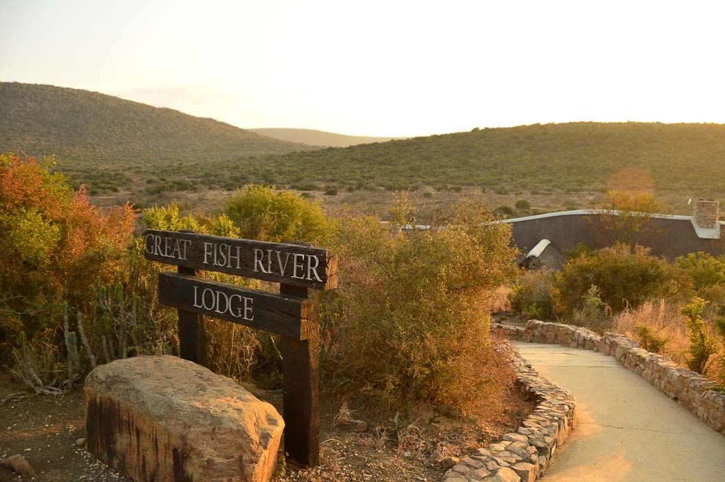 Africa Honeymoon Ideas - Your Complete Guide 5 sign for great fish river lodge with african landscape behind