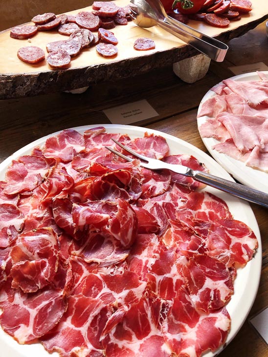 plates of salami and sliced meats in Puglia