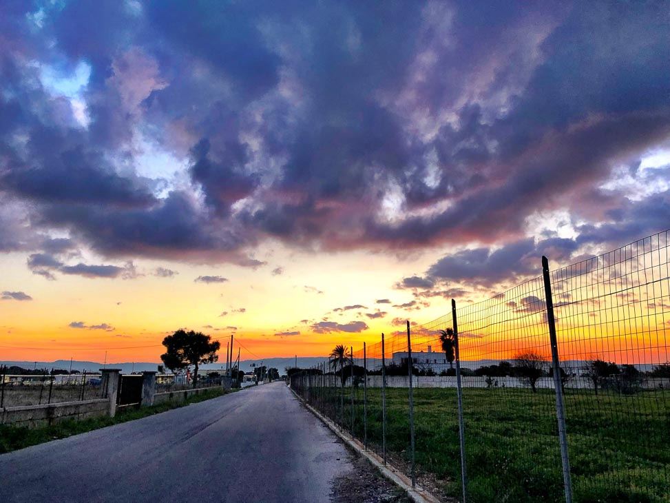 7 Best Places to Visit in Puglia (2022) 22 road at sunset in Savelletri Puglia