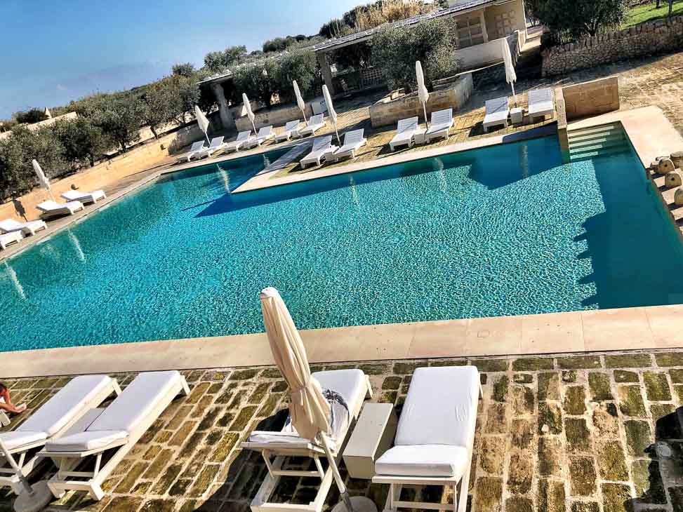 7 Best Places to Visit in Puglia (2022) 11 The outdoor swimming pool at Borgo Egnazia