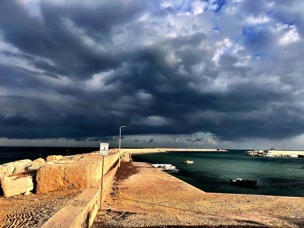 7 Best Places to Visit in Puglia (2022) 20 Stormy clouds on the waterfront in Savelltri