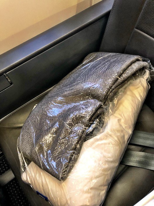 American Airlines Premium Economy 777 Review - Is it Worth Paying Extra? 18 American Airlines Premium Economy blanket and pillow
