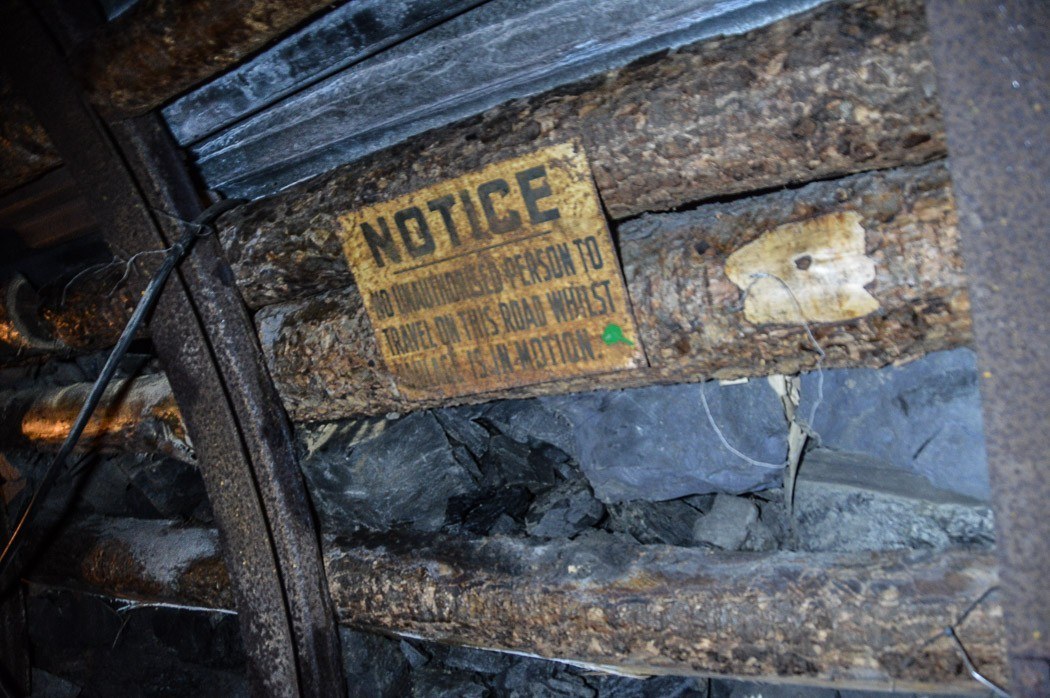 7 Best Places to Visit in South Wales - The Valleys (2022) 4 Notice sign to keep out in the mining tunnels of the welsh mining experience