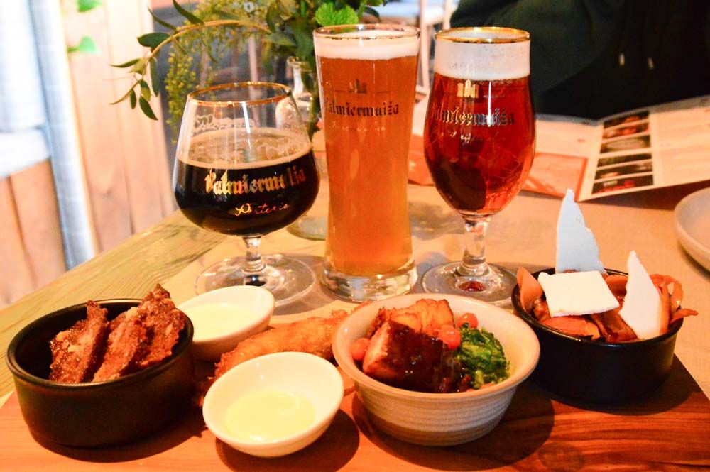 beers and bar snacks on the riga beer district tour