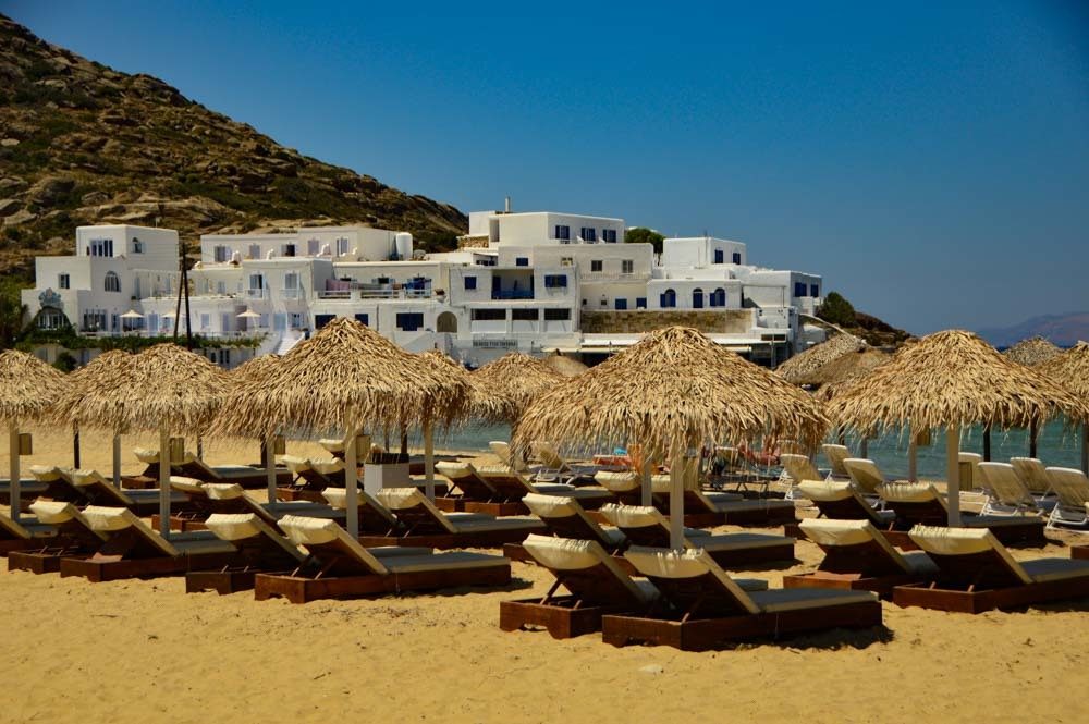 17 Best Things to do in Ios 27 greece_ios_mylopotas-beach-sun-loungers-and-umbrellas