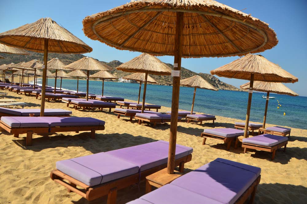 17 Best Things to do in Ios 28 greece_ios_mylopotas-purple-sun-loungers-beach