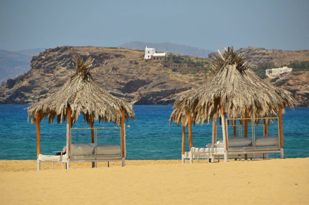 Santorini to Ios: How to get there & Should you Stay in Santorini 7 greece_ios_mylopotas-umbrellas-and-loungers