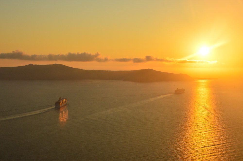 Santorini to Ios: How to get there & Should you Stay in Santorini 5 greece_santorini_sunset