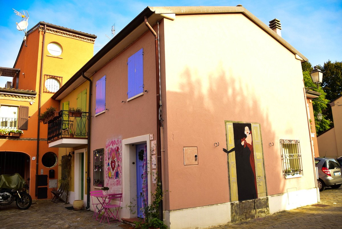14 Fantastic Things to do in Rimini that you'll Love 5 Italy_Rimini_street-art-colourful-houses-2